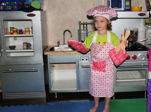 cooking2.jpg.... Lila is 3